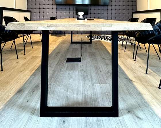 Image 1 of Dining table with oak tree trunk top on metal U-leg