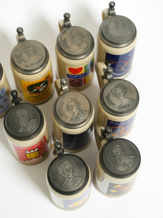 Image 1 of Nine unused original Munich Oktoberfest beer Pitchers with heavy tin lids from 2001 - 2009