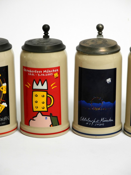 Image 1 of Nine unused original Munich Oktoberfest beer Pitchers with heavy tin lids from 2001 - 2009