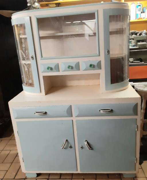 Retro kitchen cabinet with engraved flowers in the glass