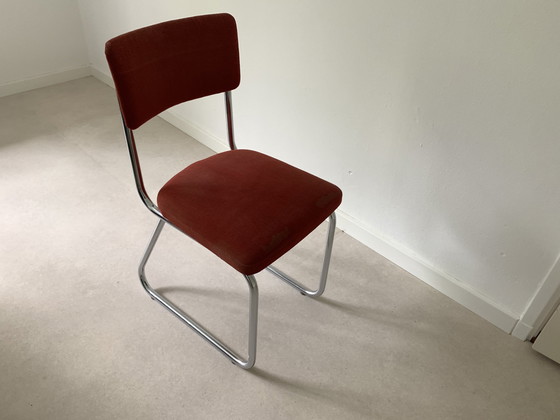 Image 1 of Silla de tubo con tapizado rojo