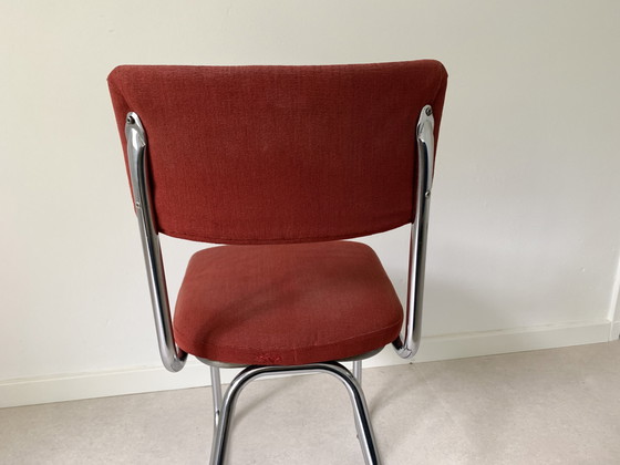 Image 1 of Silla de tubo con tapizado rojo