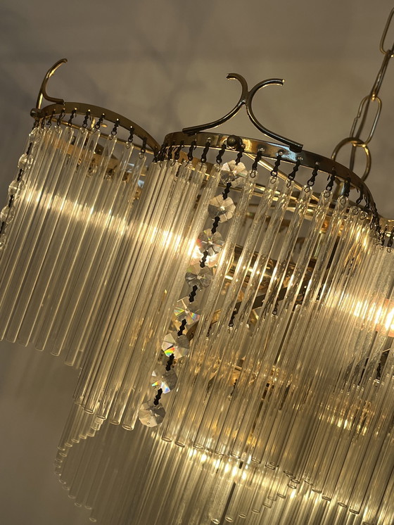 Image 1 of Vintage large rod chandelier regency style