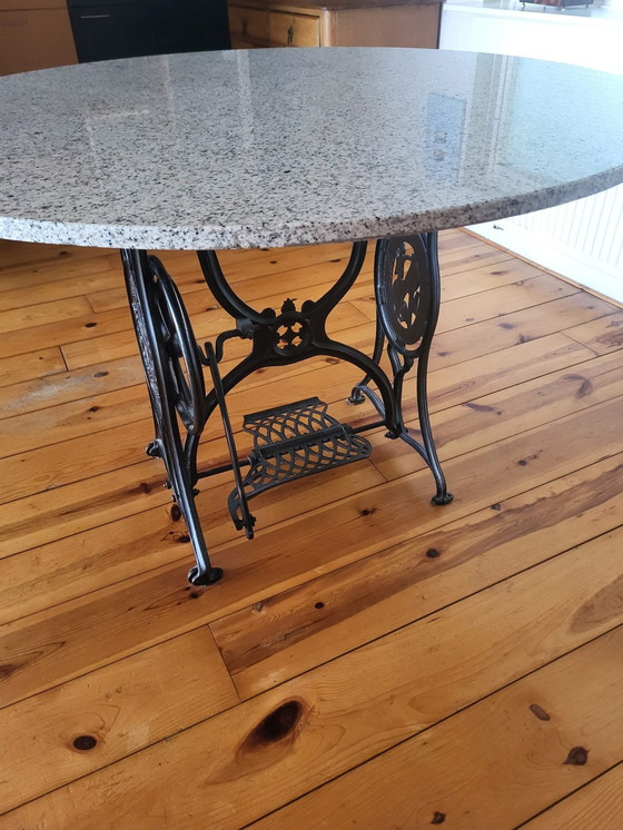 Image 1 of Granite Table With Wrought Iron Sewing Table As Base