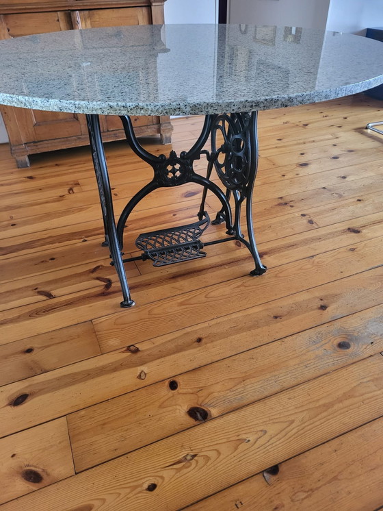 Image 1 of Granite Table With Wrought Iron Sewing Table As Base