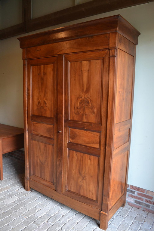 Sleek antique walnut cabinet