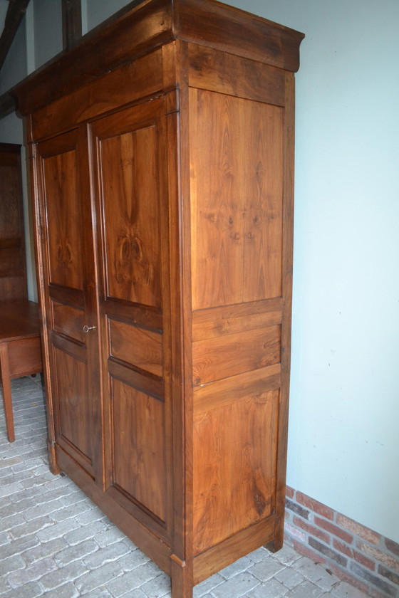 Image 1 of Sleek antique walnut cabinet