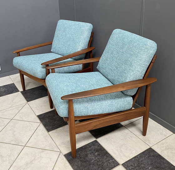 Image 1 of set of 2 teak easy arm chairs 1960s