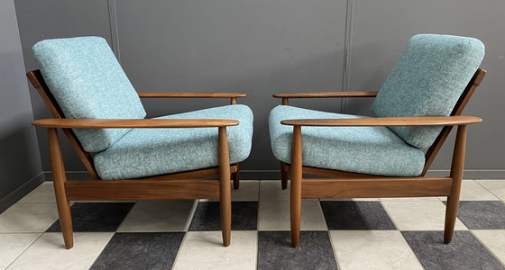 Image 1 of set of 2 teak easy arm chairs 1960s