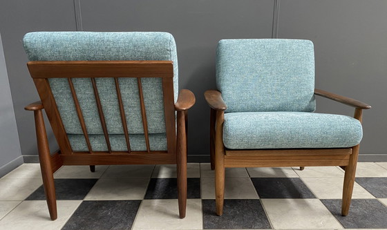 Image 1 of set of 2 teak easy arm chairs 1960s