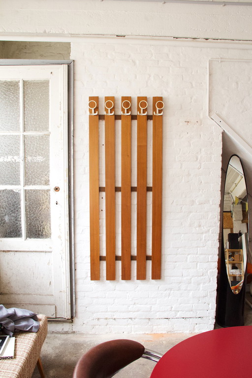 Wall-mounted wooden coat rack