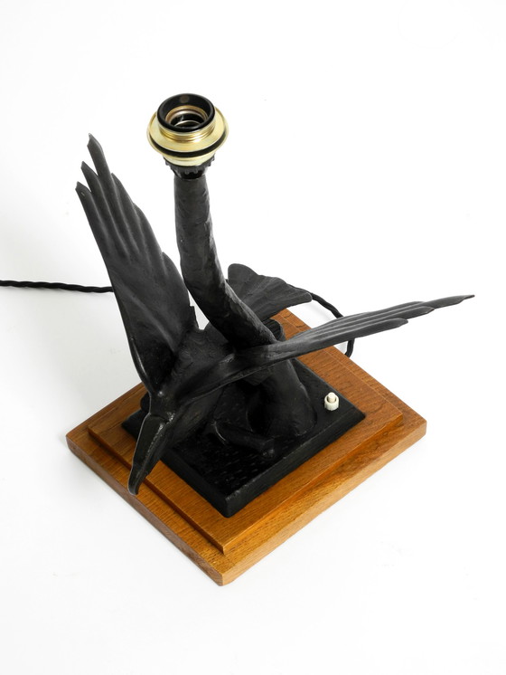 Image 1 of Large 1940s table lamp made of iron in the shape of an eagle with a teak wooden base