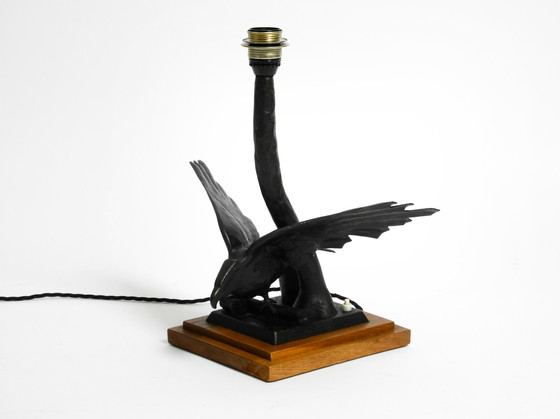 Image 1 of Large 1940s table lamp made of iron in the shape of an eagle with a teak wooden base