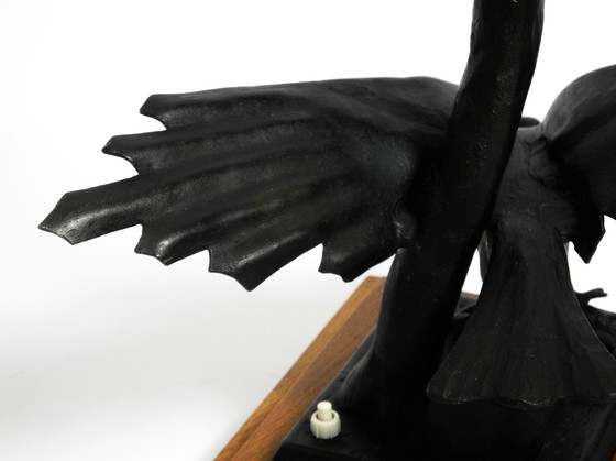 Image 1 of Large 1940s table lamp made of iron in the shape of an eagle with a teak wooden base