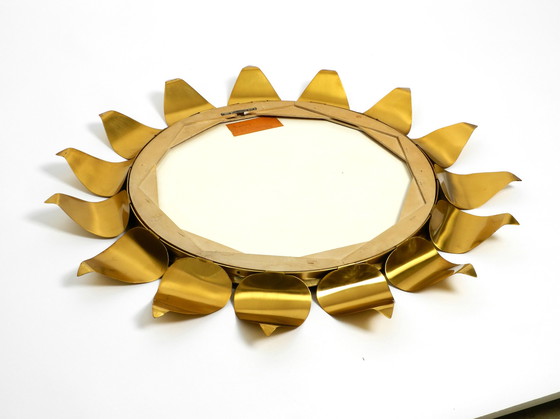 Image 1 of Beautiful round Mid Century brass sunburst wall mirror