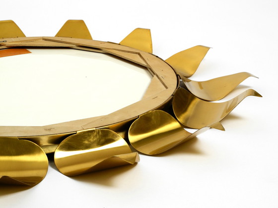 Image 1 of Beautiful round Mid Century brass sunburst wall mirror