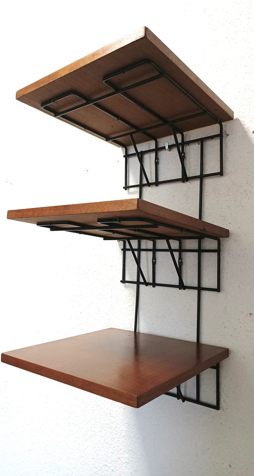 Sixties string wall rack with three tiers