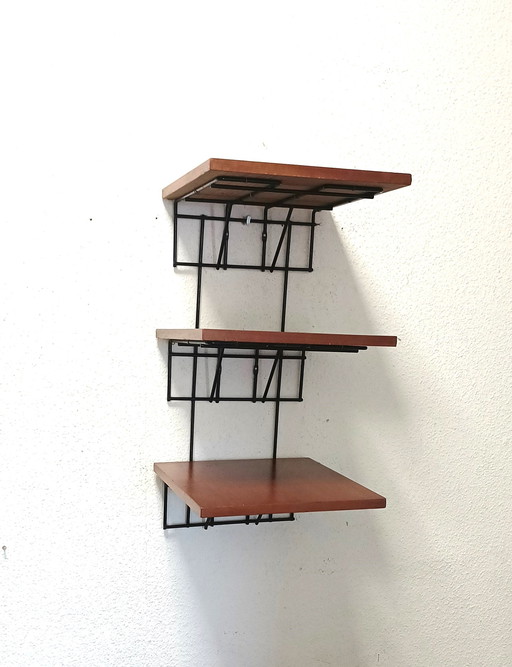 Sixties string wall rack with three tiers