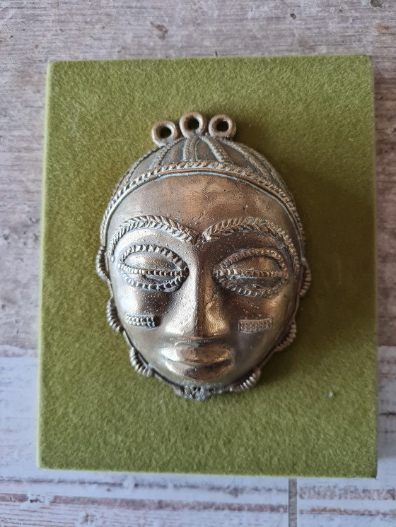 Image 1 of 2x African female and male faces in bronze on wood support