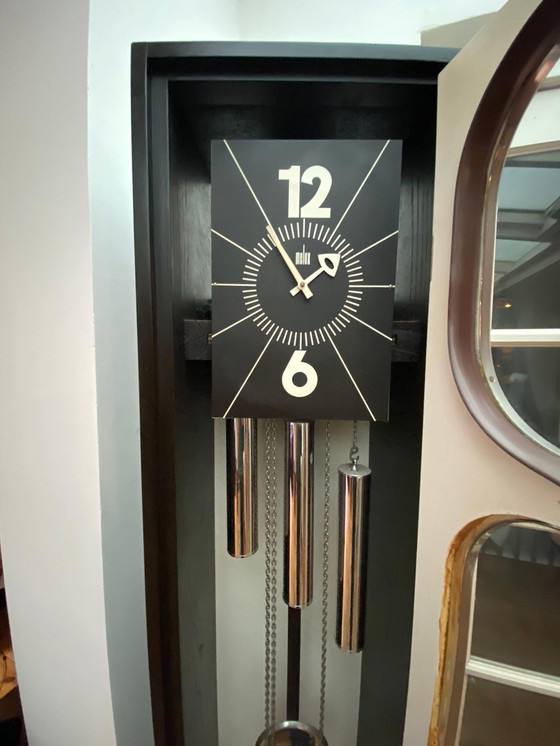 Image 1 of Horloge Melux en position verticale