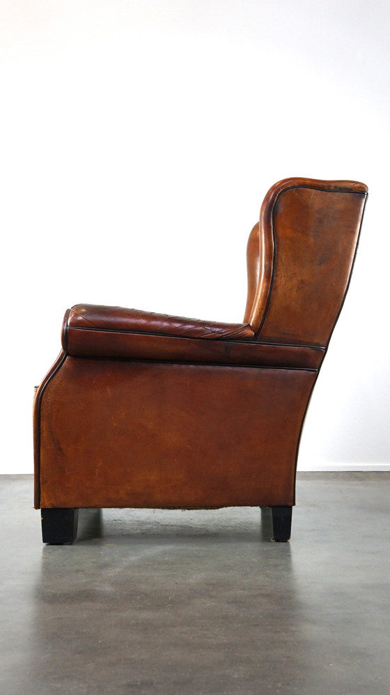 Image 1 of Grand fauteuil à oreilles en cuir de mouton