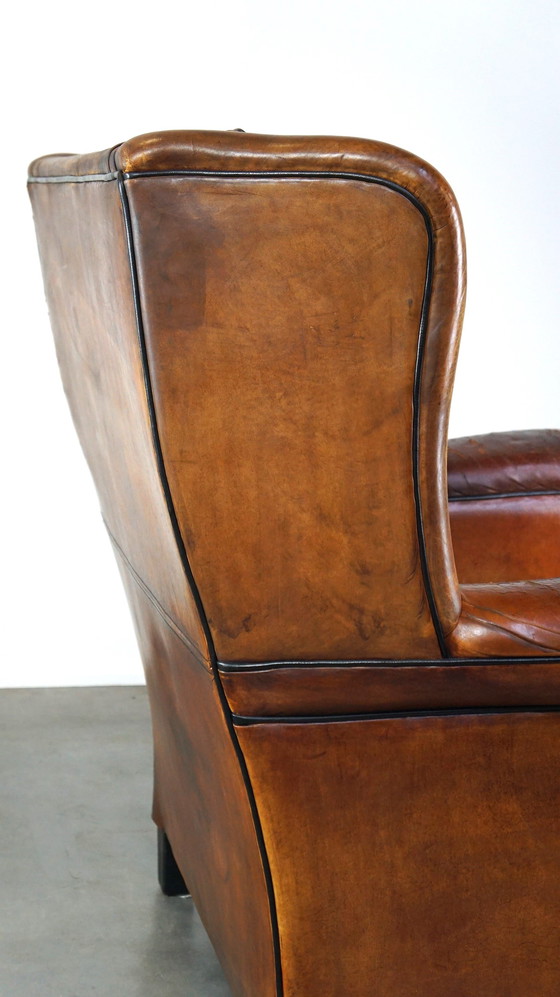 Image 1 of Grand fauteuil à oreilles en cuir de mouton