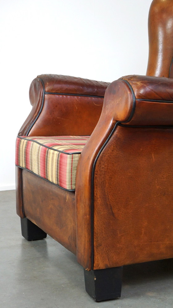 Image 1 of Grand fauteuil à oreilles en cuir de mouton