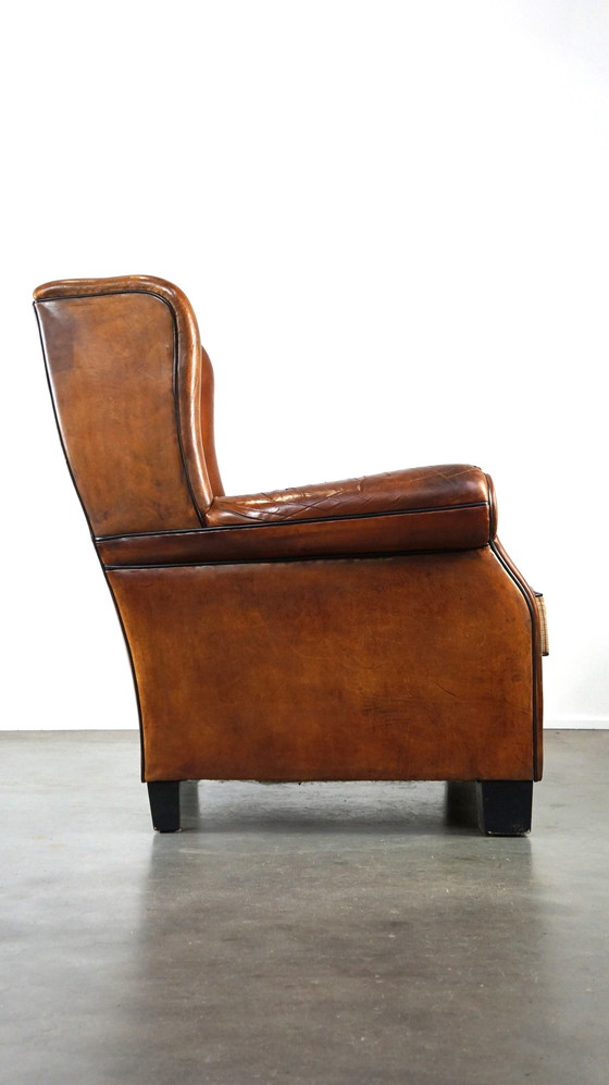 Image 1 of Grand fauteuil à oreilles en cuir de mouton