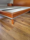 Cherry wood bed with two oval nightstands and matching lamps