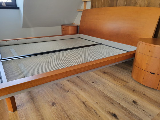 Image 1 of Cherry wood bed with two oval nightstands and matching lamps