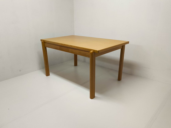 Image 1 of Table de salle à manger extensible en chêne