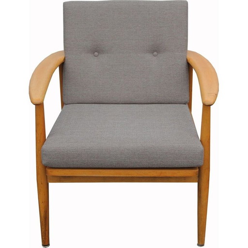 Vintage armchair in bright wood, 1960s