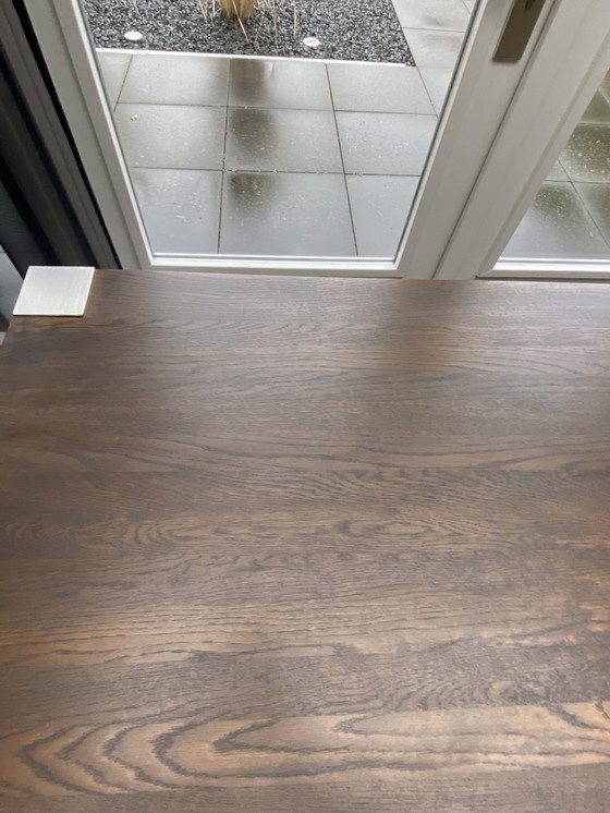 Image 1 of Tavolo da pranzo Cross Mc Glan, piano in rovere con gambe in acciaio inossidabile