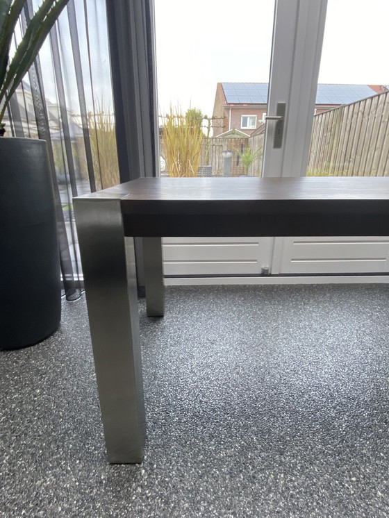 Image 1 of Tavolo da pranzo Cross Mc Glan, piano in rovere con gambe in acciaio inossidabile