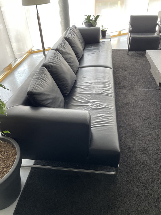 Image 1 of 2x B&B Italia sofas black leather with 2x footstool and side table