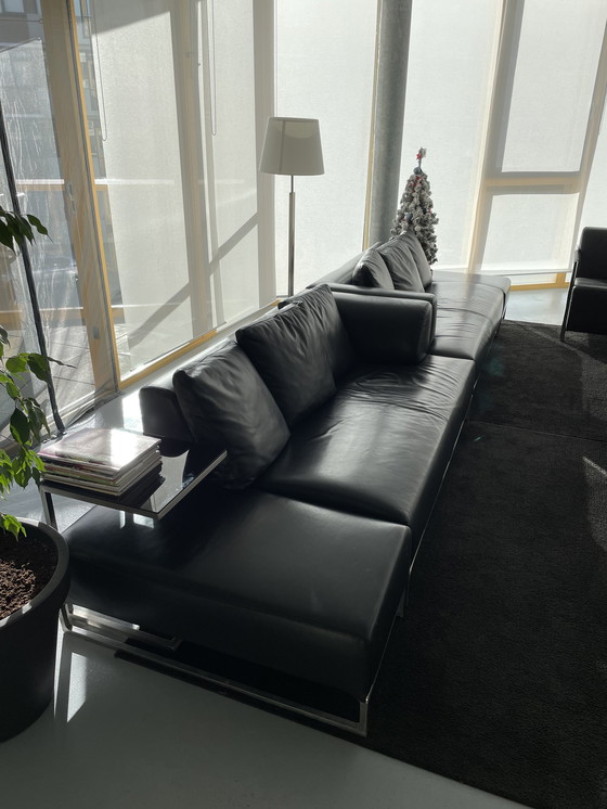 Image 1 of 2x B&B Italia sofas black leather with 2x footstool and side table