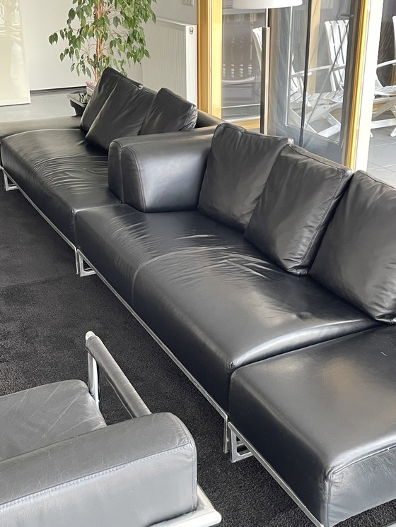 Image 1 of 2x B&B Italia sofas black leather with 2x footstool and side table