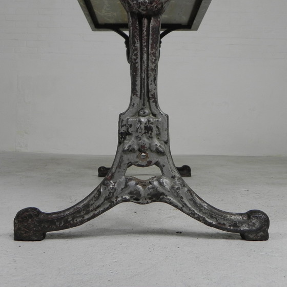 Image 1 of Bistro table, garden table with marble top and rare cast iron frame