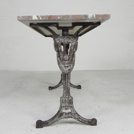 Image 1 of Bistro table, garden table with marble top and rare cast iron frame