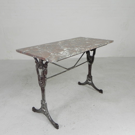 Image 1 of Bistro table, garden table with marble top and rare cast iron frame