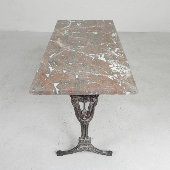 Image 1 of Bistro table, garden table with marble top and rare cast iron frame