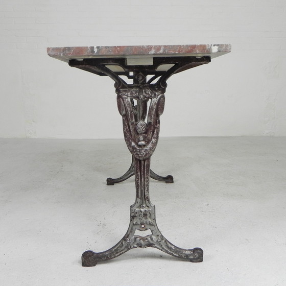 Image 1 of Bistro table, garden table with marble top and rare cast iron frame