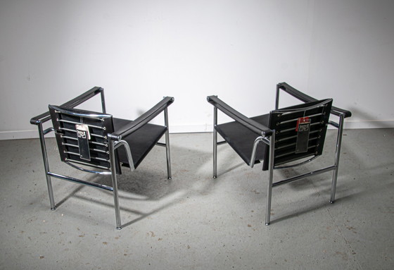 Image 1 of Ensemble de 2 chaises longues Cassina LC1 avec certificats d'origine 1980