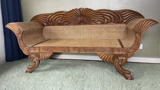 Image 1 of Javanese teak bench with carvings and webbing