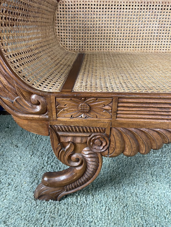 Image 1 of Javanese teak bench with carvings and webbing