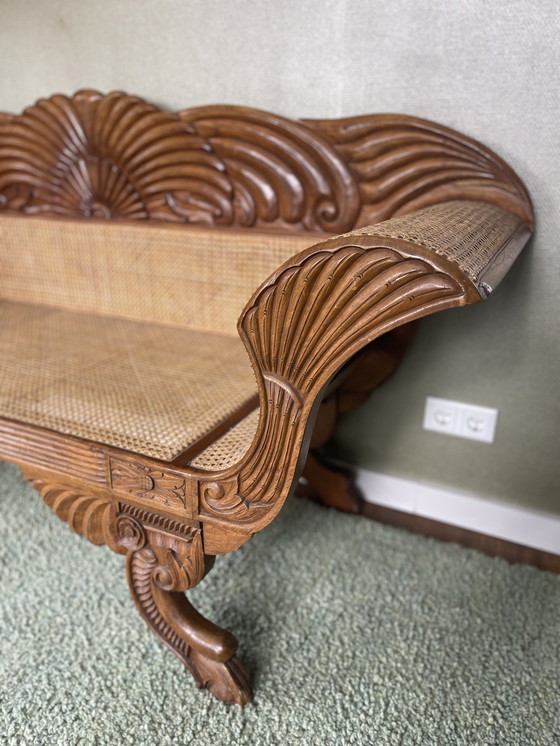 Image 1 of Javanese teak bench with carvings and webbing