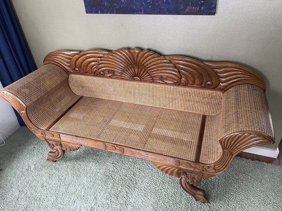 Image 1 of Javanese teak bench with carvings and webbing