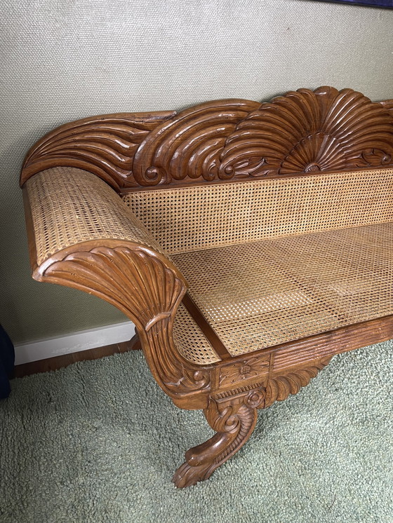 Image 1 of Javanese teak bench with carvings and webbing