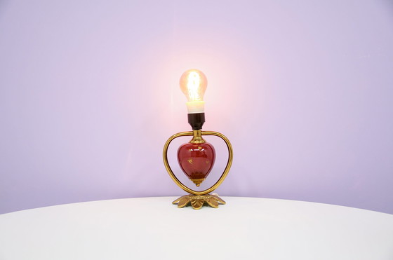 Image 1 of gold & red wall lamp