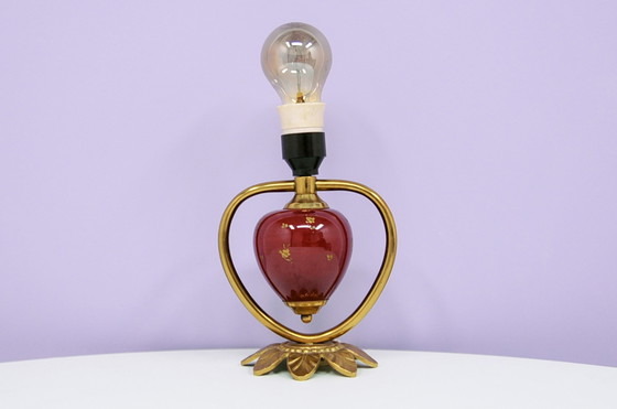 Image 1 of gold & red wall lamp